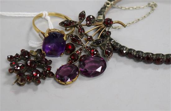 A group of garnet and amethyst set jewellery including an 18ct gold ring.